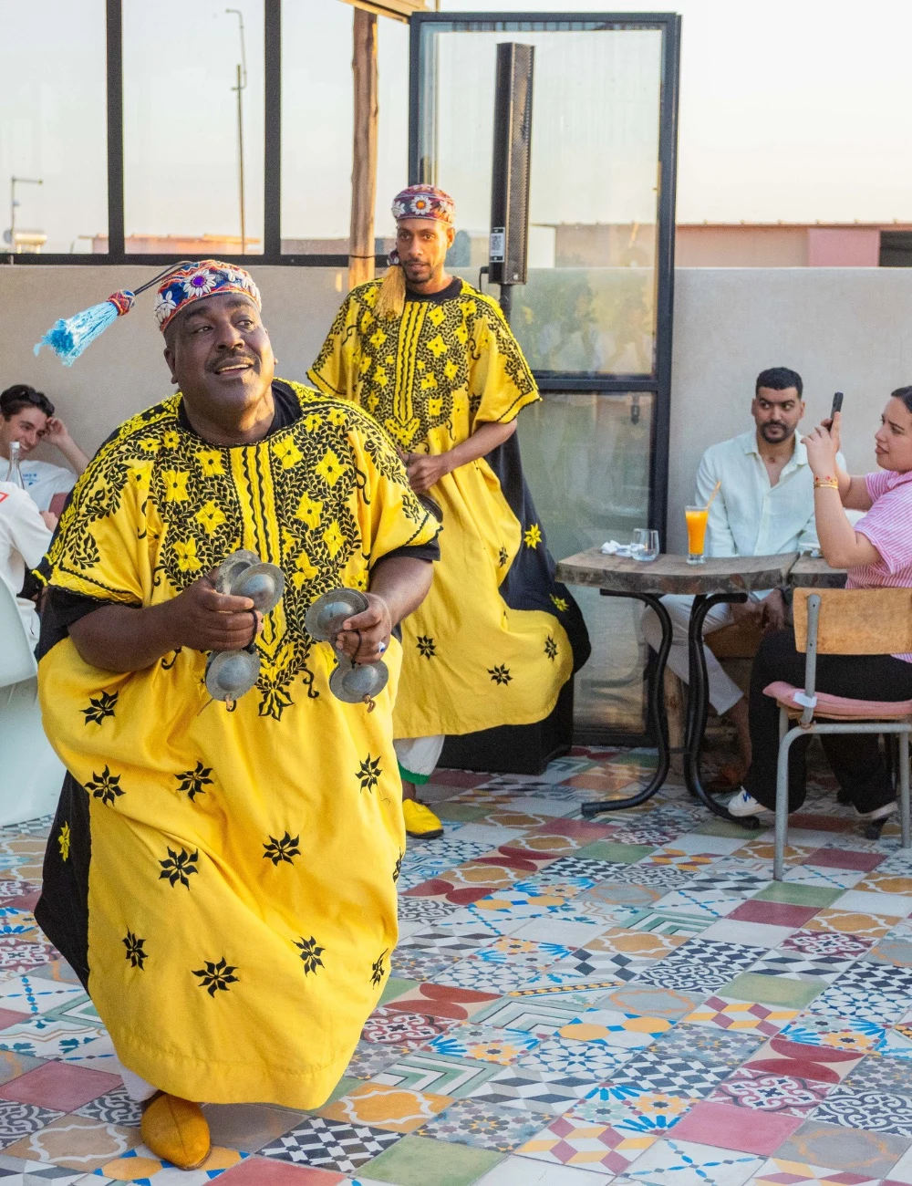 Gnaoua musicians performing on the rooftop