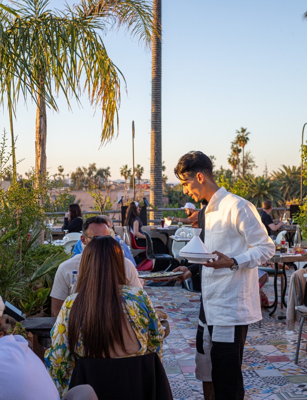 Daytime table service on the Coco Rooftop restaurant terrace in Marrakech